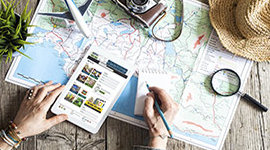 Browsing travel guides on a table